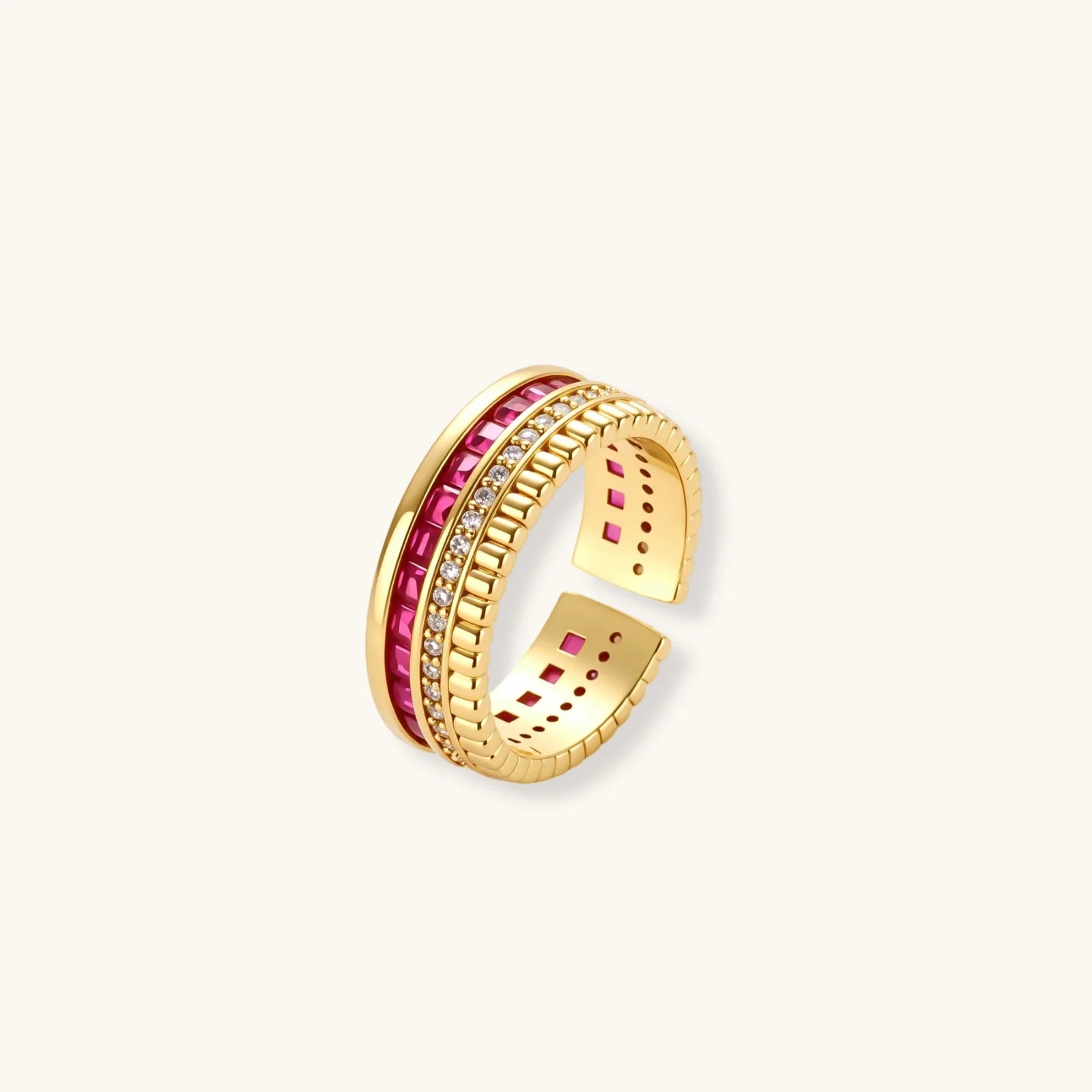 Three-piece jewelry set featuring 14K gold plated pieces with deep red cubic zirconia stones and clear crystals on cream background.