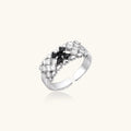Adjustable white gold plated ring with geometric grid of black and clear zirconia stones in checkerboard pattern