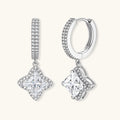 Sterling silver huggie hoops with geometric diamond-shaped moissanite dangles featuring pavé crystal details