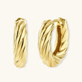 14K gold-plated twisted rope huggie hoop earrings with hinged closure on white background, showing textured surface detail