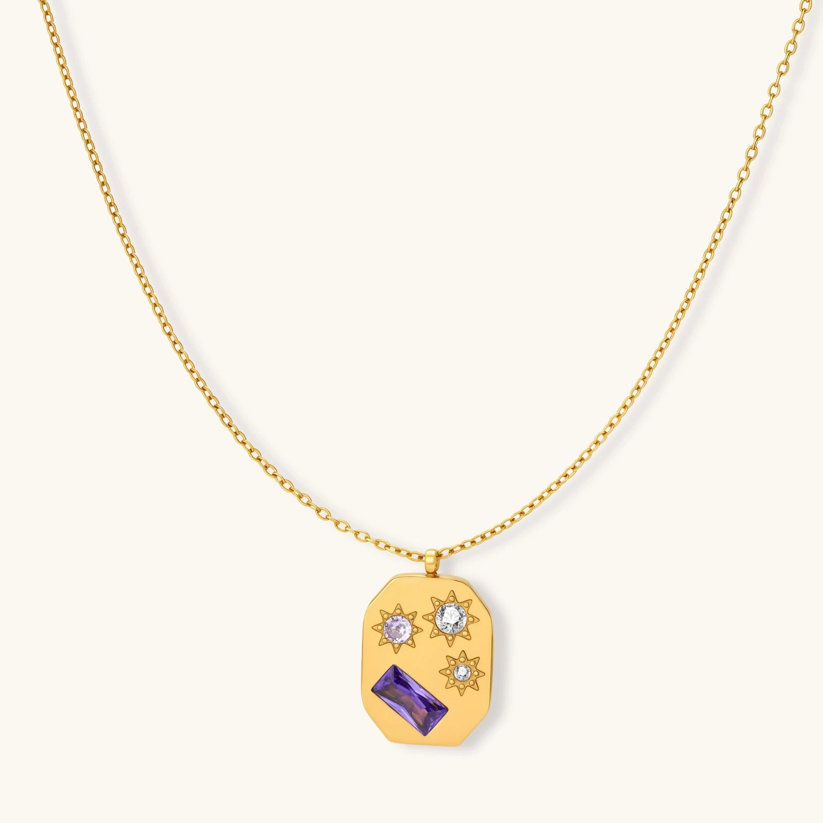 Gold-plated octagonal pendant necklace with engraved star motifs, purple baguette CZ, lavender and clear round stones on chain.