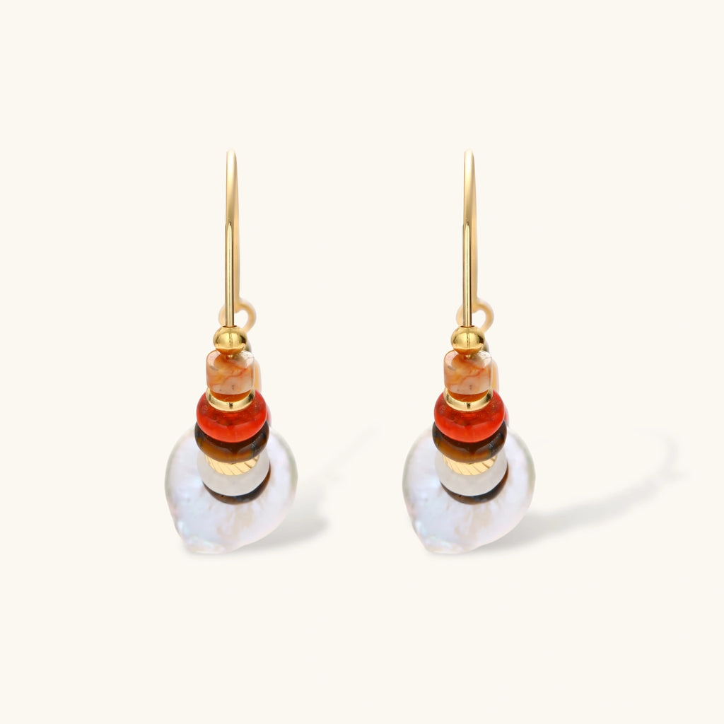 18k gold-plated earrings featuring baroque pearls and colorful natural stones in a stacked design on cream background.
